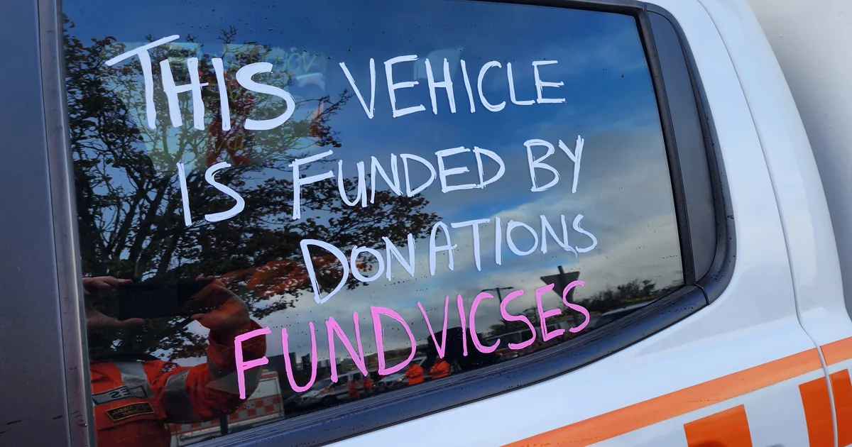 Writing on a VICSES vehicle window stating that the vehicle was funded by donations